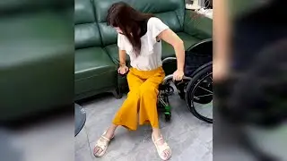 Slim Paraplegic Girl With Thin Legs Transferring