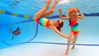 Rainbow Twin Swimming