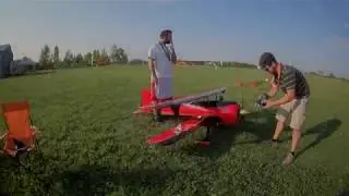 FPV Chasing a Rc Biplane