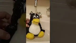 TUX taking a bath!
