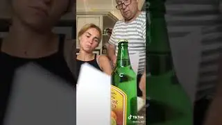 Искусство открывания бутылки листом бумаги....