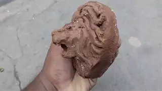 hand made lion clay statue