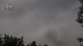 Two anti-aircraft guns ZPU-2 and zu-23-2 mounted on pickups are firing at the aircraft L-39