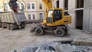 Экскаватор Hyundai r 170 w 7 с гидромолотом компании Техоптимум