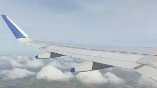 Above the Clouds – Airplane Window View (Free Stock Footage)