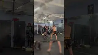 Muay Thai pad work with world champion in Thailand