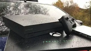 РАСПАКОВКА XBOX ONE X PROJECT SCORPIO ПОД ДОЖДЕМ...
