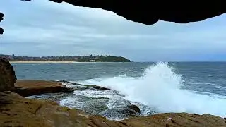 Serene Ocean Sounds: Relaxing Cloudy Day Beach Views with Waves Crashing on Rocks