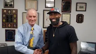 Malcolm Jenkins of the Philadelphia Eagles with Superintendent Michael Chitwood