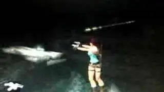 Tra Glitch-hanging on a pole with guns