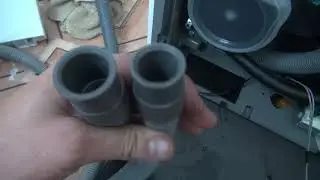 Drain hose replacement on Midea dishwasher.