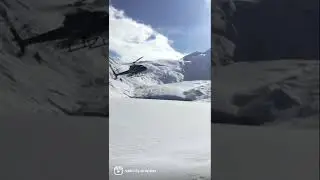 Helicopter landing on snow