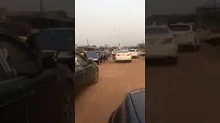 Rain of money in Benin as Yahoo throw wads of money on the street