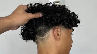 Corte em cabelo grande e cacheado