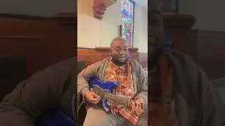 Live playing guitar at church