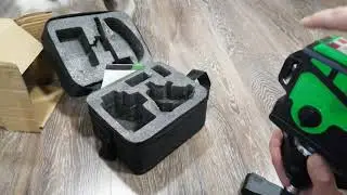 Распаковка лазерного уровня из Китая и его проверка. Лазерное шоу от канала "Как умею так и снимаю"