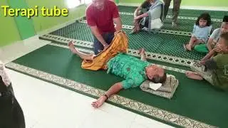 Pak Haji's therapy for back pain