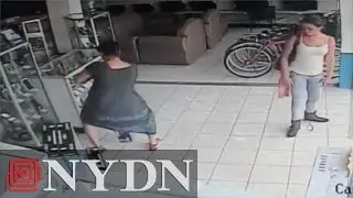 Raw: Woman in Costa Rica steals TV by hiding it under dress