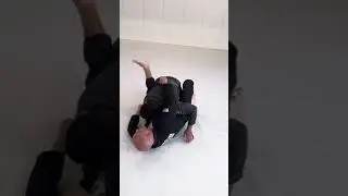 Continuing with our close guard technique: we start by pulling guard and making adjustments