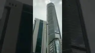People running away from China’s Tallest Skyscrapers SEG Plaza in Shenzhen, as it starts shaking.