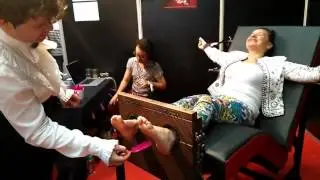 Mainstream woman feet tickling in stocks