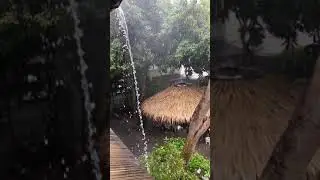 Massive Rainwater Cascade from Building's Drainage Pipe Swamps Village