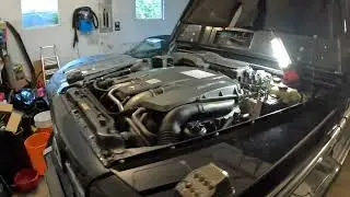 Replacing a coolant fitting on the back of the AMG G63 motor. M157 5.5L Twin Turbo Engine