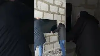 Mounting a TV on a polystyrene concrete wall with one screw! Will the wall withstand this test?