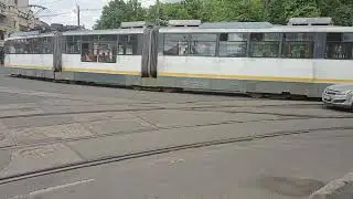 Bucharest tram 4018 passing on the street on 20/05/26