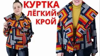 Oversized double-breasted warm jacket with a large collar and pockets Light fit and simple tailoring