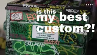 fb sized dumpster w/ graffiti