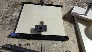 We're building a tension and release system with adjustable band saw wheel pitch.
