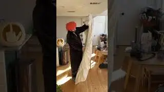 Folding a fitted sheet