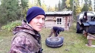 После охоты у избы. Готовим болотоход к выезду.