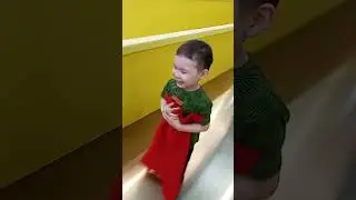 Children and parents have fun together on sliding device in an indoor playground. #slide #sliding