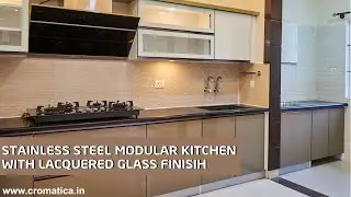 Cromatica Galvanized Steel Modular Kitchen with Lacquered Glass Shutters.