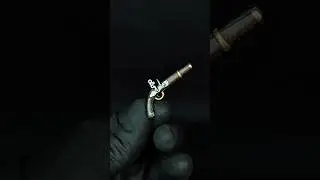 Repainting of the captured predator pistol Greyback from NECA.