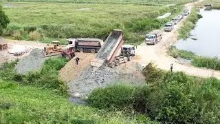 Nice View Strong Power Dump Truck Unloading Pit Soil Swamp Landfill Process Bulldozer Pushing Dirt