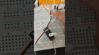 Two Push buttons to control reverse/forward rotation of Servo-motor on Arduino Board.