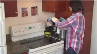 Household Cleaning Tips : How to Clean Hard Grease Off the Stove Top Cover
