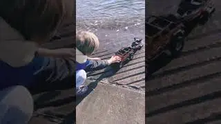 When he grows up, he will launch a real boat into the water!