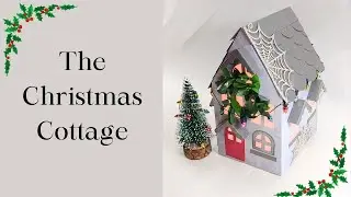 Festive Christmas Cottage Lantern with Frosty Winter Webs