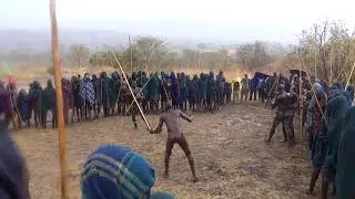 Donga Stick Fight in the Rain--Surma Tribe in Omo Valley of Ethiopia