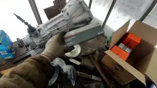 Car clutch for a skid steer. Assembly with an adapter plate.