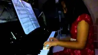 Tiara playing rumba toccata