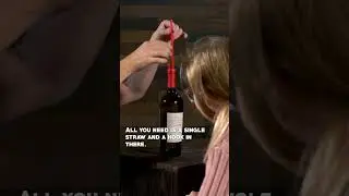 Lifting a wine bottle using only a straw