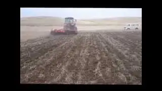 МТЗ 1523 с Дискатором БДМ Агро 4Х2 на заросшом поле2015