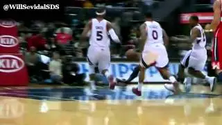Josh Smith blocks John Wall's dunk attempt