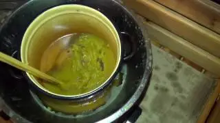 Waxing wood with beeswax and linseed oil.