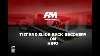 PM Truck manufactured  tilt and slide black recovery trucks on Hino truck